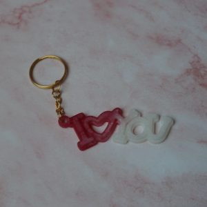 Porte clef I love you blanc et fushia en résine époxy